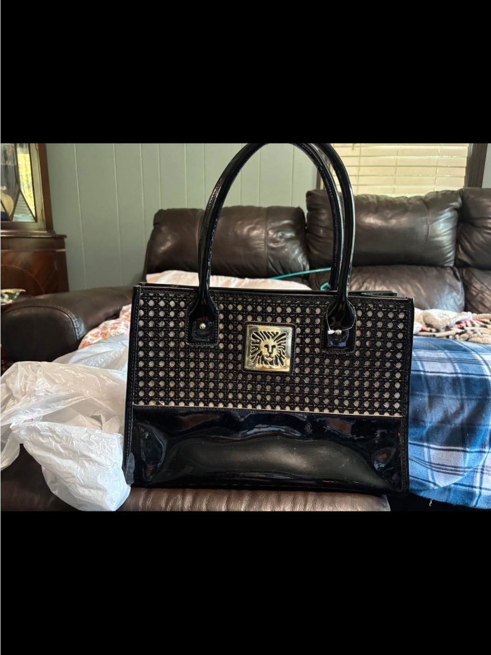 Anne Klein Black Patent Tote with Studded Panel and Gold Lion Accent